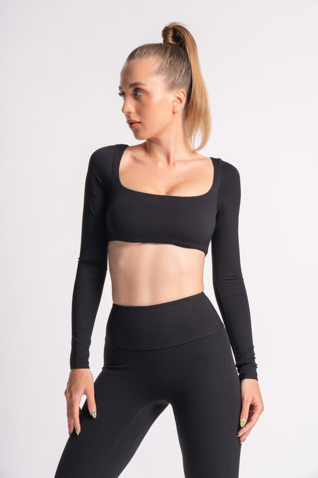 Full-sleeve crop top and high-waist yoga leggings for flexible movement